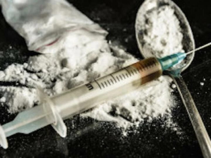 bigstockdrugsyringeandcookedheroin76081889238x179