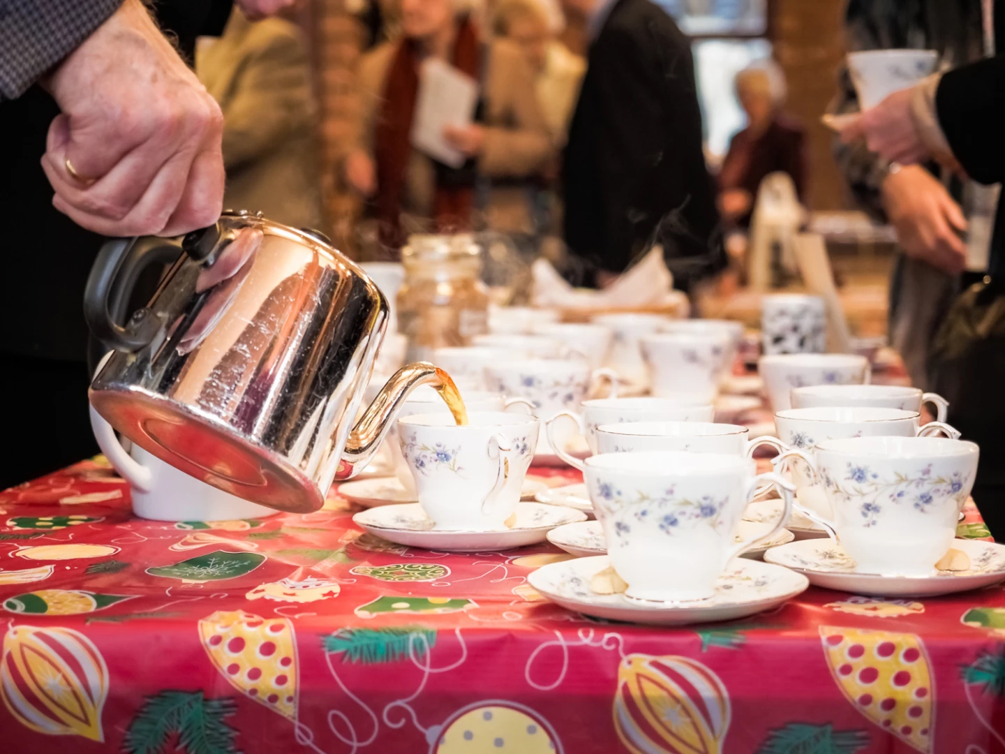 Pouring a cup of tea after the service