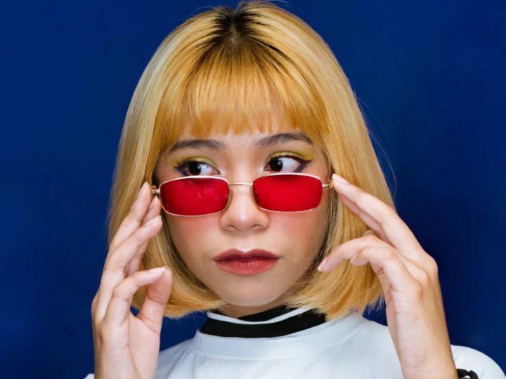 Woman in red retro glasses