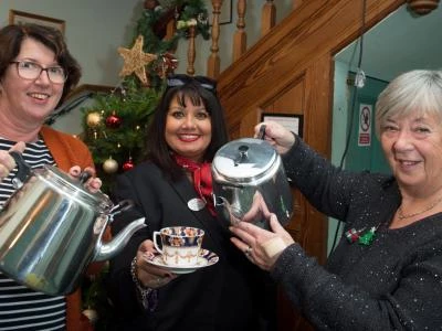 Barbour Institute, TattenhallCommunity Association Secretary Carole Hornby, Redrow Homes Sales Consultant Anita Gillespie and Community Association Chair of Trustees Patricia Black with the teapots purchased with a donation from Redrow Homes.credit: