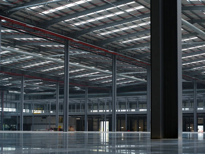 Goods stacked in a newly painted warehouse