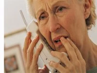 Worried Senior Person on Phone