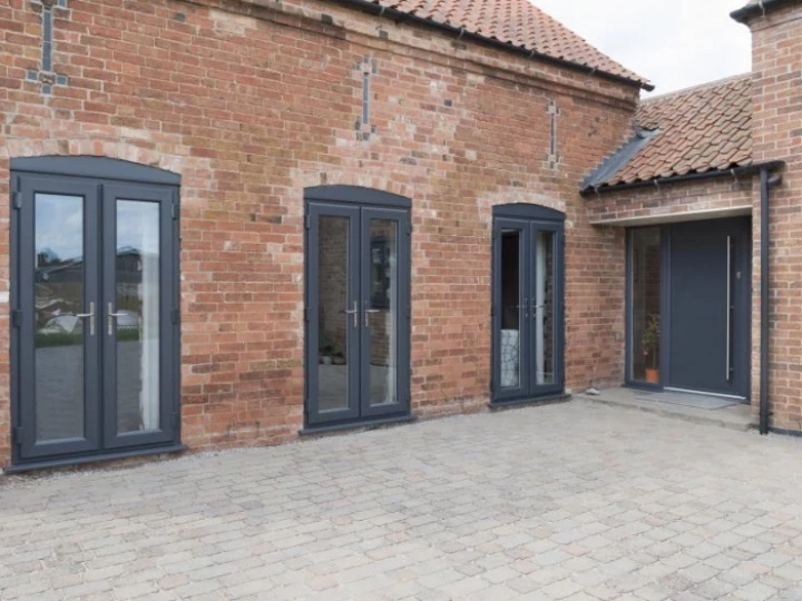 Flush sash French doors in dark grey