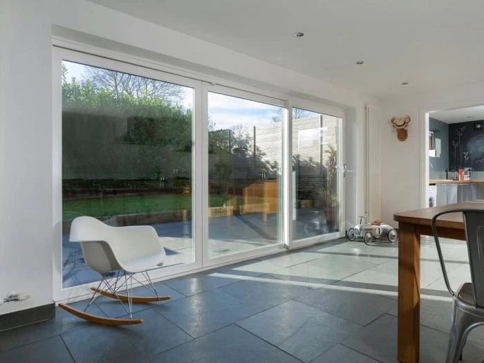 uPVC patio door with a white chair