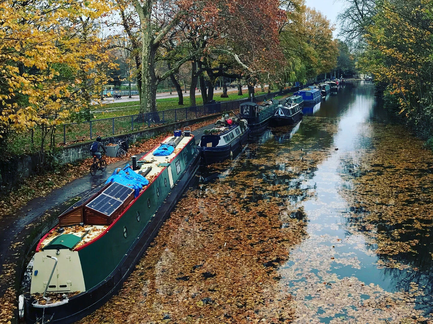 canal boats moored up in autumn
