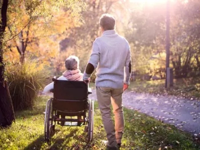 carer in woodland
