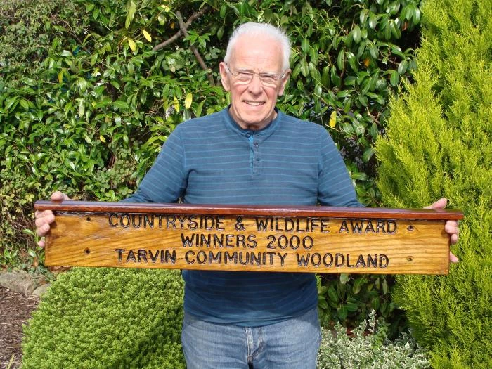 derek rawden with townfield lane award sign