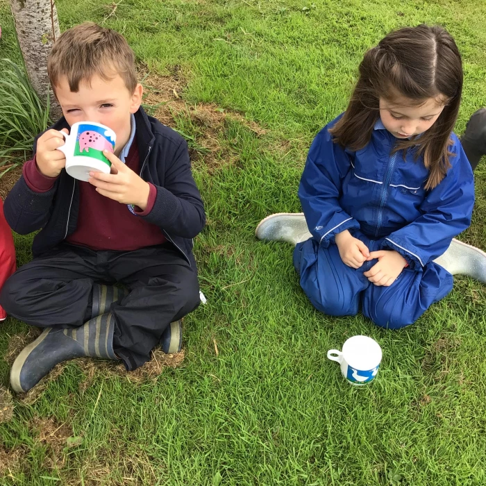 enjoying a mug of milk at the farm