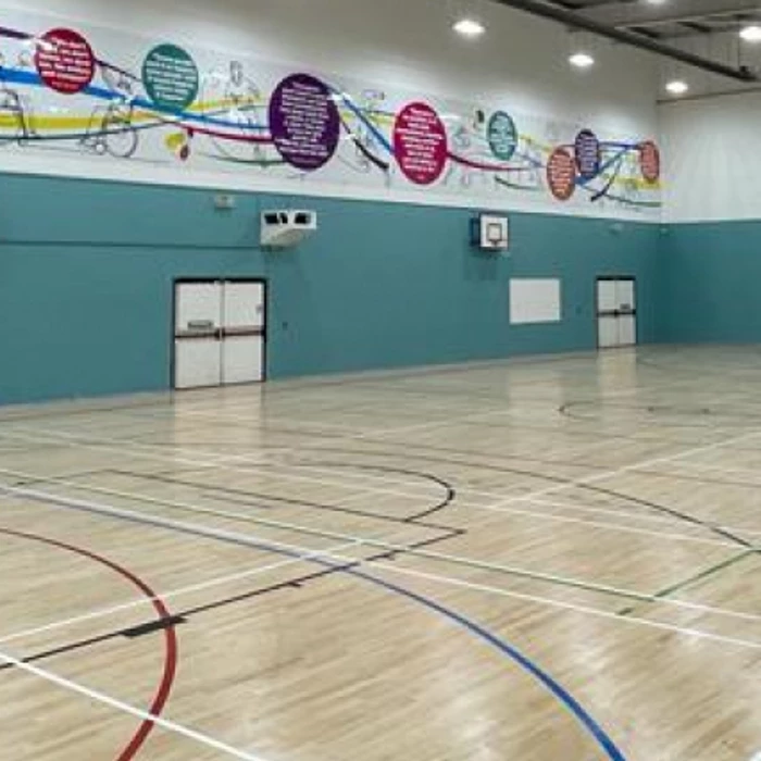 graphics on show at the refurbished sports hall at st paul39s high school in manchester