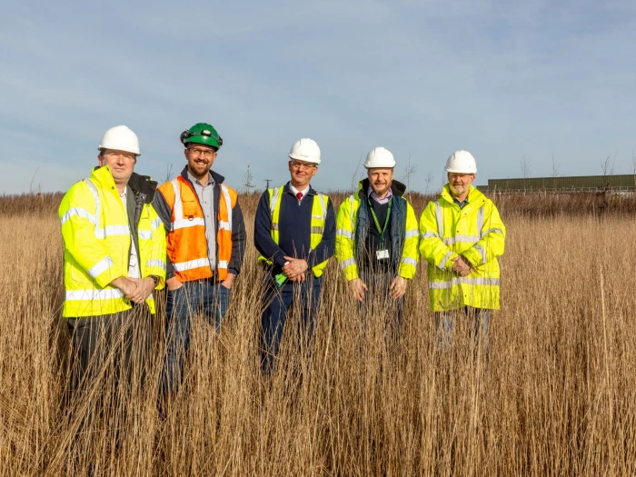 group shot with plant in background sized for email