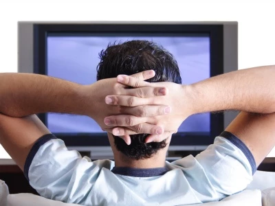 man watching tv