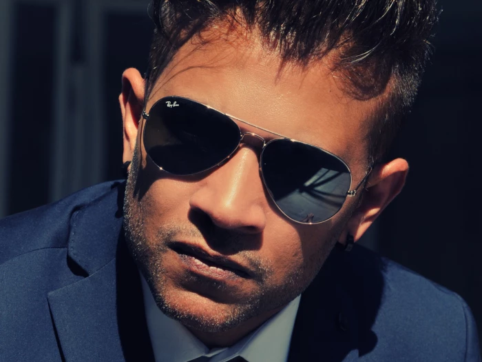 man wearing rayban sunglasses