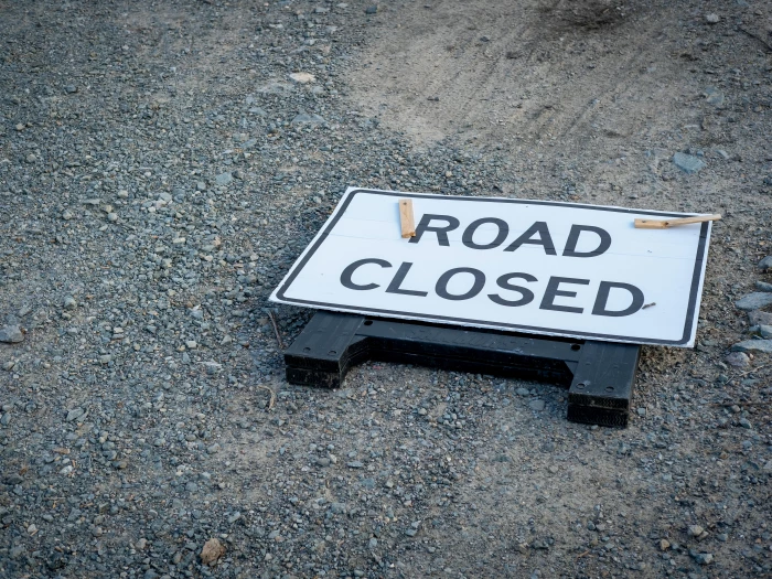 sign lying on the ground