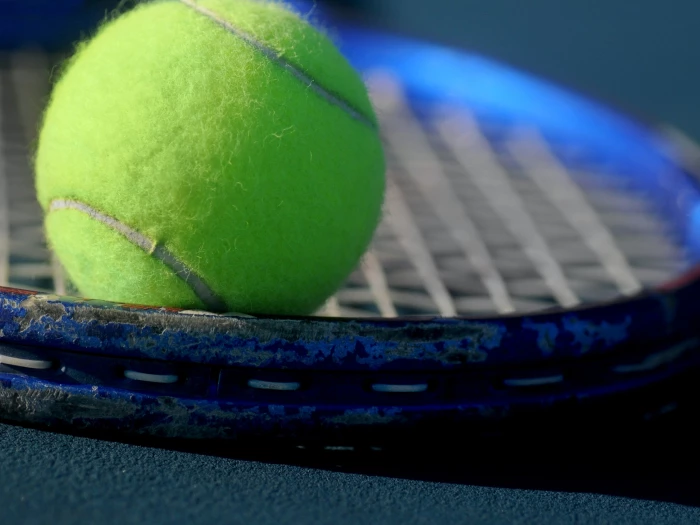 tennis ball and racquet