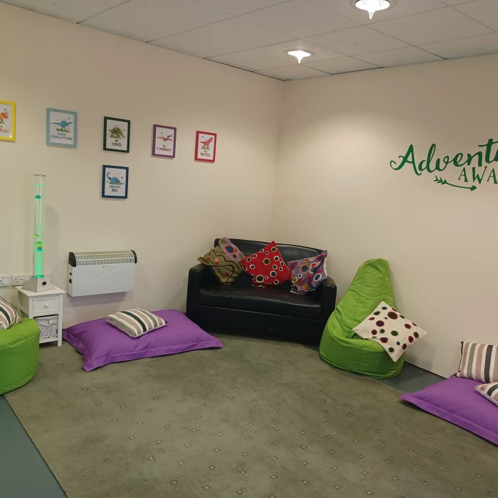 the spacious quiet room features sensory items suc