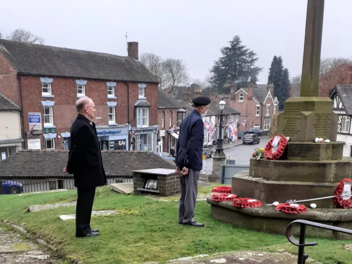 tom hassall lays wreath
