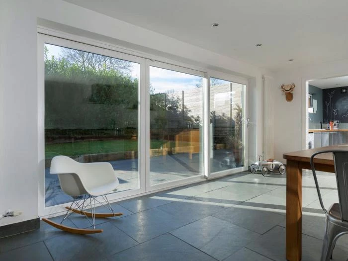 upvc patio door with a white chair