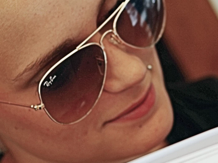 woman wearing rayban sunglasses